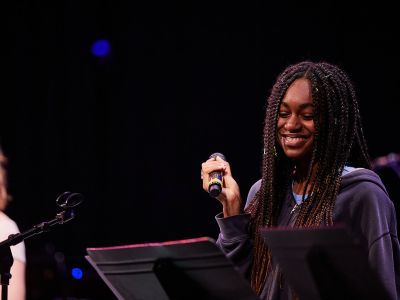 participant holding microphone